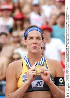 Beach volleyball Beachvolleyball - CEV European Championships 2015 KLAGENFURT,AUSTRIA,01.AUG.15 - BEACH VOLLEYBALL - CEV Beach Volleyball European Championships. Image shows Kira Walkenhorst (GER). Keywords: medal, award ceremony. GEPAxpictures xMaticxKlansek
