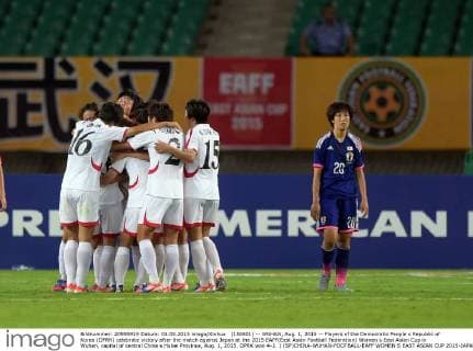 (150801) -- WUHAN, Aug. 1, 2015 -- Players of the Democratic People s Republic of Korea (DPRK) celebrate victory after the match against Japan at the 2015 EAFF(East Asian Football Federation) Women s East Asian Cup in Wuhan, capital of central China s Hubei Province, Aug. 1, 2015. DPRK won 4-2. ) (SP)CHINA-WUHAN-FOOTBALL-EAFF WOMEN S EAST ASIAN CUP 2015-JAPAN VS DPRK ChengxMin 