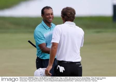 Aug. 1, 2015 - Gainesville, Virginia, United States - Tiger Woods (L) shakes hands with Charles Howell III on the 18th green after the third round of the Quicken Loans National at Robert Trent Jones GC. PGA Golf Herren 2015 - Quicken Loans National - Round 3 - ZUMAw109