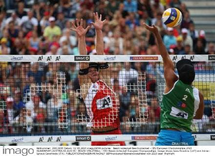 Beach volleyball Beachvolleyball - CEV European Championships 2015 KLAGENFURT,AUSTRIA,02.AUG.15 - BEACH VOLLEYBALL - CEV Beach Volleyball European Championships. Image shows Janis Smedins (LAT) and Adrian Ignacio Carambula (ITA). GEPAxpictures xDanielxGoetzhaber