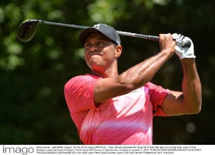 Tiger Woods watches his drive off of the 18th tee during the final round of the Quicken Loans National at Robert Trent Jones Golf Course in Gainesville, Virginia on August 2, 2015.  WAP20150802301 KEVINxDIETSCH