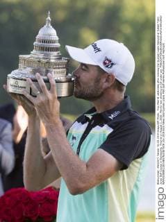 Troy Merritt celebrates after winning the Quicken Loans National at Robert Trent Jones Golf Course in Gainesville, Virginia on August 2, 2015. Merritt won shooting an 18-under-par.  WAP20150802310 KEVINxDIETSCH