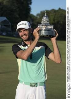 Troy Merritt celebrates after winning the Quicken Loans National at Robert Trent Jones Golf Course in Gainesville, Virginia on August 2, 2015. Merritt won shooting an 18-under-par.  WAP20150802312 KEVINxDIETSCH
