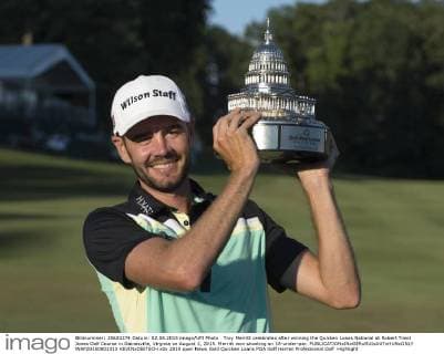 Troy Merritt celebrates after winning the Quicken Loans National at Robert Trent Jones Golf Course in Gainesville, Virginia on August 2, 2015. Merritt won shooting an 18-under-par.  WAP20150802313 KEVINxDIETSCH