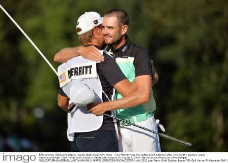 Troy Merritt hugs his caddie Scott Sajtinac after winning the Quicken Loans National at Robert Trent Jones Golf Course in Gainesville, Virginia on August 2, 2015. Merritt won shooting an 18-under-par.  WAP20150802314 KEVINxDIETSCH
