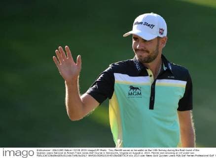 Troy Merritt waves as he walks on the 15th fairway during the final round of the Quicken Loans National at Robert Trent Jones Golf Course in Gainesville, Virginia on August 2, 2015. Merritt won shooting an 18-under-par.  WAP20150802319 KEVINxDIETSCH