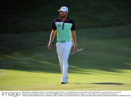 Troy Merritt waves as he walks on the 15th fairway during the final round of the Quicken Loans National at Robert Trent Jones Golf Course in Gainesville, Virginia on August 2, 2015. Merritt won shooting an 18-under-par.  WAP20150802320 KEVINxDIETSCH