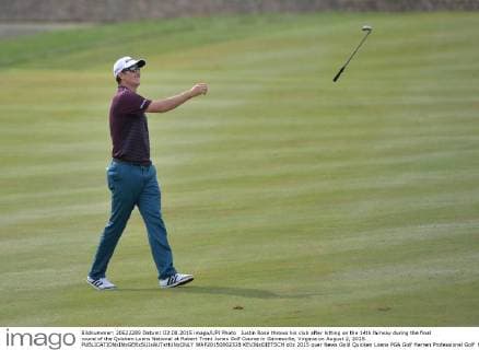 Justin Rose throws his club after hitting on the 14th fairway during the final round of the Quicken Loans National at Robert Trent Jones Golf Course in Gainesville, Virginia on August 2, 2015.  WAP20150802328 KEVINxDIETSCH