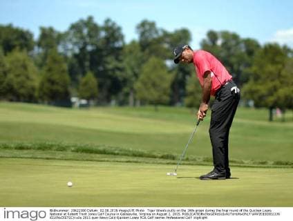 Tiger Woods putts on the 16th green during the final round of the Quicken Loans National at Robert Trent Jones Golf Course in Gainesville, Virginia on August 2, 2015.  WAP20150802339 KEVINxDIETSCH
