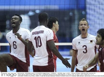 (150803) -- TEHRAN, Aug. 3, 2015 -- Players of Qatar celebrate after winning the match against Japan at the 18th Asian Men s Volleyball Championship at Azadi Stadium in Tehran, Iran, on Aug. 3, 2015. Qatar won 3-2. ) (SP)IRAN-TEHRAN-VOLLEYBALL-JAPAN VS QATAR AhmadxHalabisaz 