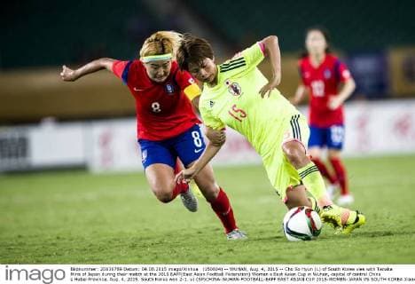 (150804) -- WUHAN, Aug. 4, 2015 -- Cho So Hyun (L) of South Korea vies with Tanaka Mina of Japan during their match at the 2015 EAFF(East Asian Football Federation) Women s East Asian Cup in Wuhan, capital of central China s Hubei Province, Aug. 4, 2015. South Korea won 2-1. u) (SP)CHINA-WUHAN-FOOTBALL-EAFF EAST ASIAN CUP 2015-WOMEN-JAPAN VS SOUTH KOREA XiaoxYiji 