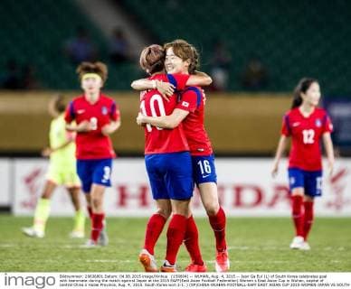 (150804) -- WUHAN, Aug. 4, 2015 -- Jeon Ga Eul (L) of South Korea celebrates goal with teammate during the match against Japan at the 2015 EAFF(East Asian Football Federation) Women s East Asian Cup in Wuhan, capital of central China s Hubei Province, Aug. 4, 2015. South Korea won 2-1. ) (SP)CHINA-WUHAN-FOOTBALL-EAFF EAST ASIAN CUP 2015-WOMEN-JAPAN VS SOUTH KOREA XiaoxYijiu 
