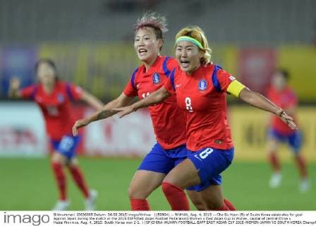 (150804) -- WUHAN, Aug. 4, 2015 -- Cho So Hyun (R) of South Korea celebrates for goal against Japan during the match at the 2015 EAFF(East Asian Football Federation) Women s East Asian Cup in Wuhan, capital of central China s Hubei Province, Aug. 4, 2015. South Korea won 2-1. ) (SP)CHINA-WUHAN-FOOTBALL-EAFF EAST ASIAN CUP 2015-WOMEN-JAPAN VS SOUTH KOREA ChengxMin 