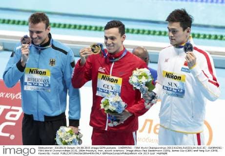 SWIMMING - FINA World Championships 2015 KAZAN,RUSSIA,04.AUG.15 - SWIMMING - FINA World Championships 2015, 200m freestyle, men, award ceremony. Image shows Paul Biedermann (GER), James Guy (GBR) and Yang Sun (CHN). Keywords: medal. GEPAxpictures xPhilippxBrem