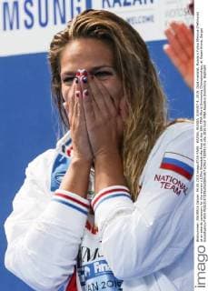 KAZAN, RUSSIA. AUGUST 4, 2015. Gold medalist, Russia s Yuliya Efimova (Yefimova) at an awards ceremony for the women s 100m Breaststroke final at the 16th FINA World Swimming Championships, at Kazan Arena. Sergei Savostyanov TASS  TS009175
