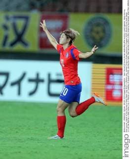 Jeon Ga-eul of South Korea celebrates after scoring a goal against Japan during their soccer match of the Women s East Asian Cup 2015 in Wuhan city, central China s Hubei province, 4 August 2015. South Korea beat Japan 2-1 at the Women s East Asian Cup in Wuhan on Tuesday (4 August 2015), giving the team their second victory in the ongoing tournament after they defeated China on Saturday. The first half saw Japan in the lead with a goal from Emi Nakajima, but South Korea came back in the second half when captain Cho So-Hyun equalised in the 54th minute. Midfielder Jeon Ga-Eul then sealed the team s fate during three minutes of injury time. South Korea beat Japan 2-1 in Women s East Asian Cup  20150804_09174