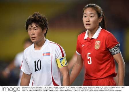 (L-R) Sim Un Ra (PRK), Haiyan Wu (CHN), AUGUST 4, 2015 - Football Soccer : EAFF Women s East Asian Cup 2015 between China 2-3 North Korea at Wuhan Sports Center Stadium, Wuhan, China. NoxThirdxPartyxSales  (dlra007418)
