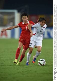 (L-R) Jun Liu (CHN), Yegyong Ri (PRK), AUGUST 4, 2015 - Football Soccer : EAFF Women s East Asian Cup 2015 between China 2-3 North Korea at Wuhan Sports Center Stadium, Wuhan, China. NoxThirdxPartyxSales  (dlra007436)