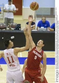 August 4, 2015. - Russia, Moscow region, Novogorsk. - Basketball. Russia - China friendly match. In picture: Russian national basketball team player Ruslan Pateev (5, in red). PhotoagencyxInterpress 