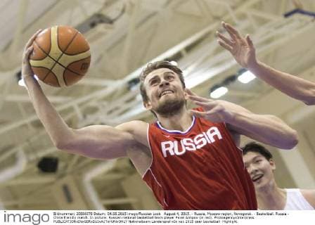 August 4, 2015. - Russia, Moscow region, Novogorsk. - Basketball. Russia - China friendly match. In picture: Russian national basketball team player Pavel Antipov (in red). PhotoagencyxInterpress 