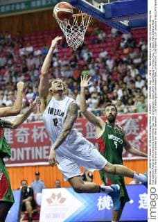 (150807) -- QINGYUAN, Aug. 7, 2015 -- New Zealand s Isaac Fotu (C) shoots during the final against Mexico at the Stankovic Continental Cup 2015 in Qingyuan, south China s Guangdong Province, Aug. 7, 2015. New Zealand beat Mexico 70-66 in the final and claimed the title of the event. ) (SP)CHINA-QINGYUAN-BASKETBALL-STANKOVIC CONTINENTAL CUP LiangxXu 