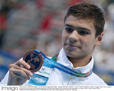 KAZAN, RUSSIA. AUGUST 7, 2015. Bronze medalist, Russia s Evgeny Rylov at an awards ceremony for the men s 200m Backstroke final at the 16th FINA World Swimming Championships, at Kazan Arena. Yegor Aleyev TASS  TS0094BA