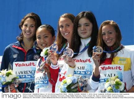 KAZAN, RUSSIA. AUGUST 7, 2015. Silver medalist, US Micah Lawrence, Gold medalist, Japan s Kanako Watanabe and Bronze medalists, Denmark s Rikke Moller Pedersen, China s Jinglin Shi, Spain s Jessica Vall (L-R) at an awards ceremony for the women s 200m Breaststroke final at the 16th FINA World Swimming Championships, at Kazan Arena. Valery Sharifulin TASS  TS0094F6