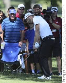 Aug. 7, 2015 - Akron, OH, USA - Dustin Johnson chips on to the 7th green during the second round of the World Golf Championships-Bridgestone Invitational at Firestone County Club on Friday, Aug. 7, 2015. Bridgestone Invitational second round - ZUMAm67_