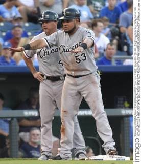 Aug. 7, 2015 - Kansas City, MO, USA - The Chicago White Sox s Melky Cabrera (53) jokes with Kansas City Royals catcher Salvador Perez after Cabrera reached third in the second inning at Kauffman Stadium in Kansas City, Mo., on Friday, Aug. 7, 2015. Eaton left the game. Chicago White Sox at Kansas City Royals - ZUMAm67_