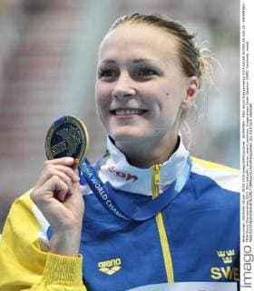 SWIMMING - FINA World Championships 2015 KAZAN,RUSSIA,08.AUG.15 - SWIMMING - FINA World Championships 2015, 50m butterfly, women, award ceremony. Image shows Sarah Sjostrom (SWE). Keywords: medal. GEPAxpictures xPhilippxBrem