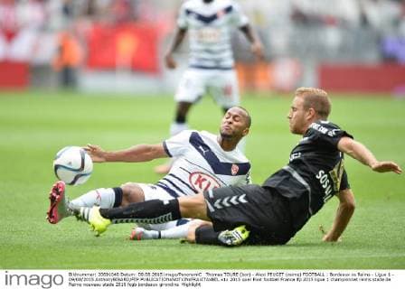 Thomas TOURE (bor) - Alexi PEUGET (reims) FOOTBALL : Bordeaux vs Reims - Ligue 1 - 09 08 2015 AnthonyBIBARD FEP 