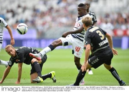 ANDRE BIYOGO POKO (bor) - Alexi PEUGET (reims) FOOTBALL : Bordeaux vs Reims - Ligue 1 - 09 08 2015 AnthonyBIBARD FEP 