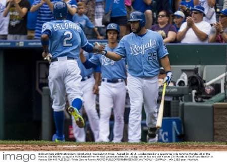 August 09, 2015: Alcides Escobar 2 celebrates with Kendrys Morales 25 of the Kansas City Royals during the MLB Baseball Herren USA game between the Chicago White Sox and the Kansas City Royals at Kauffman Stadium in Kansas City MO MLB 2015: White Sox vs Royals AUG 09 - ZUMAc04_