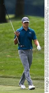 Aug. 9, 2015 - Akron, OH, USA - Jordan Spieth twirls his driver as he walks up the fairway on the 13th hole during the final round of the World Golf Championships-Bridgestone Invitational on Sunday, Aug. 9, 2015, at Firestone Country Club in Akron, Ohio. World Golf Championships-Bridgestone Invitational - ZUMAm67_