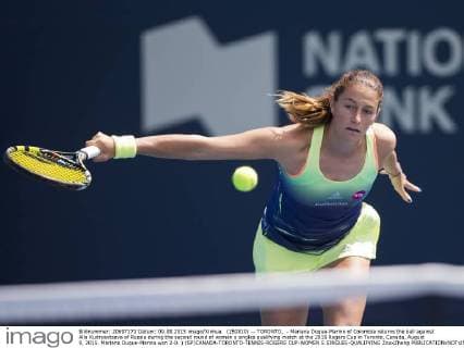 (150810) -- TORONTO, - Mariana Duque-Marino of Colombia returns the ball against Alla Kudryavtseva of Russia during the second round of women s singles qualifying match at the 2015 Rogers Cup in Toronto, Canada, August 9, 2015. Mariana Duque-Marino won 2-0. ) (SP)CANADA-TORONTO-TENNIS-ROGERS CUP-WOMEN S SINGLES-QUALIFYING ZouxZheng 