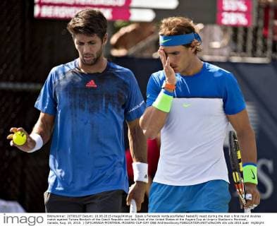 Spain s Fernando Verdasco Rafael Nadal(R) react during the men s first round doubles match against Tomas Berdych of the Czech Republic and Jack Sock of the United States at the Rogers Cup at Uniprix Stadiumin Montreal, Canada, Aug. 10, 2015. ) (SP)CANADA-MONTREAL-ROGERS-CUP-DAY ONE AndrewxSoong 