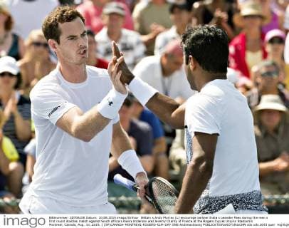 Britain s Andy Murray (L) encourage partner India s Leander Paes during the men s first round doubles match against South Africa s Kevin Anderson and Jeremy Chardy of France at the Rogers Cup at Uniprix Stadiumin Montreal, Canada, Aug. 10, 2015. ) (SP)CANADA-MONTREAL-ROGERS-CUP-DAY ONE AndrewxSoong 