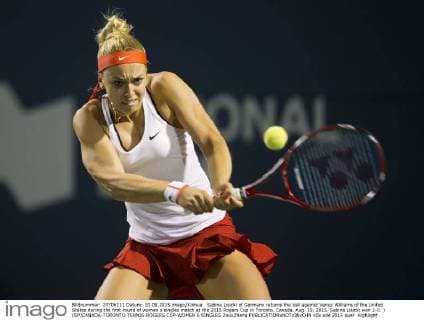 Sabine Lisicki of Germany returns the ball against Venus Williams of the United States during the first round of women s singles match at the 2015 Rogers Cup in Toronto, Canada, Aug. 10, 2015. Sabine Lisicki won 2-0. ) (SP)CANADA-TORONTO-TENNIS-ROGERS CUP-WOMEN S SINGLES ZouxZheng 