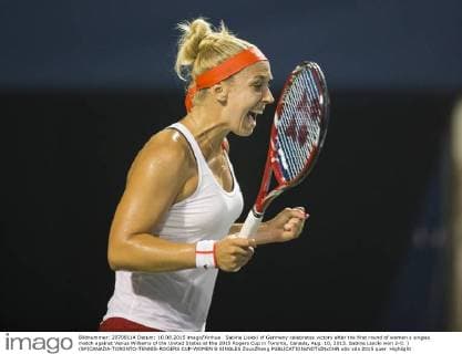 Sabine Lisicki of Germany celebrates victory after the first round of women s singles match against Venus Williams of the United States at the 2015 Rogers Cup in Toronto, Canada, Aug. 10, 2015. Sabine Lisicki won 2-0. ) (SP)CANADA-TORONTO-TENNIS-ROGERS CUP-WOMEN S SINGLES ZouxZheng 