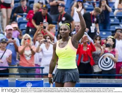 TORONTO, Aug. 11, 2015 -- Serena Williams of the United States reacts after winning the second round women s singles match against Flavia Pennetta of Italy at the 2015 Rogers Cup in Toronto, Canada, on Aug. 11, 2015. Serena Williams won 2-1. ) (SP)CANADA-TORONTO-TENNIS-ROGERS CUP-WOMEN S SINGLES ZouxZheng 