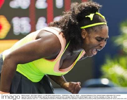 TORONTO, Aug. 11, 2015 -- Serena Williams of the United States celebrates for a score against Flavia Pennetta of Italy during the second round women s singles match at the 2015 Rogers Cup in Toronto, Canada, on Aug. 11, 2015. Serena Williams won 2-1. ) (SP)CANADA-TORONTO-TENNIS-ROGERS CUP-WOMEN S SINGLES ZouxZheng 