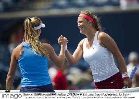 TORONTO, Aug. 11, 2015 -- Victoria Azarenka (R) shakes hands with Elina Svitolina of Ukraine after the first round women s singles match at the 2015 Rogers Cup in Toronto, Canada, on Aug. 11, 2015. Victoria Azarenka won 2-0. ) (SP)CANADA-TORONTO-TENNIS-ROGERS CUP-WOMEN S SINGLES ZouxZheng 