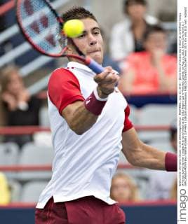 MONTREAL, Aug. 11, 2015 -- Borna Coric of Croatia hits a return to Jo-Wilfried Tsonga of France during the men s singles first round match at the 2015 Rogers Cup in Montreal, Canada, on Aug. 11, 2015. Borna Coric lost 0-2. ) (SP)CANADA-MONTREAL-TENNIS-ROGERS CUP-MEN S SINGLES AndrewxSoong 
