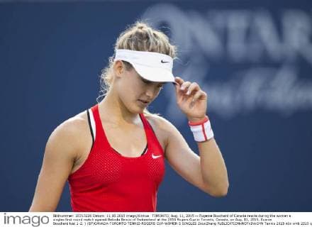 TORONTO, Aug. 11, 2015 -- Eugenie Bouchard of Canada reacts during the women s singles first round match against Belinda Bencic of Switzerland at the 2015 Rogers Cup in Toronto, Canada, on Aug. 11, 2015. Euenie Bouchard lost 1-2. ) (SP)CANADA-TORONTO-TENNIS-ROGERS CUP-WOMEN S SINGLES ZouxZheng 