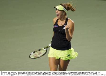 TORONTO, Aug. 11, 2015 -- Belinda Bencic of Switzerland celebrates victory after the women s singles first round match against Euenie Bouchard of Canada at the 2015 Rogers Cup in Toronto, Canada, on Aug. 11, 2015. Belinda Bencic won 2-1. ) (SP)CANADA-TORONTO-TENNIS-ROGERS CUP-WOMEN S SINGLES ZouxZheng 