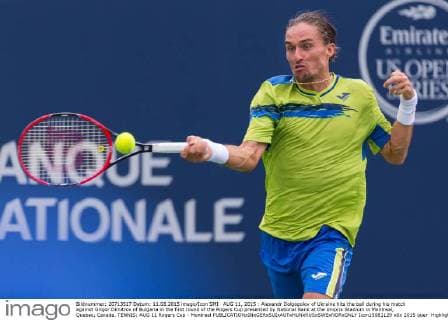 AUG 11, 2015 : Alexandr Dolgopolov of Ukraine hits the ball during his match against Grigor Dimitrov of Bulgaria in the first round of the Rogers Cup presented by National Bank at the Uniprix Stadium in Montreal, Quebec, Canada. TENNIS: AUG 11 Rogers Cup - Montreal Icon15081129 EDITORIAL USE ONLY