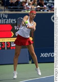 AUG 12, 2015: Lucie Safarova of the Czech Republic returns the ball to Daria Gavrilova of Russia during their match on day 3 of the Rogers Cup at the Aviva Centre in Toronto, Ontario, Canada. TENNIS: AUG 12 Rogers Cup - Toronto Icon15081245431 EDITORIAL USE ONLY
