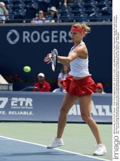 AUG 12, 2015: Lucie Safarova of the Czech Republic serves the ball to Daria Gavrilova of Russia during their match on day 3 of the Rogers Cup at the Aviva Centre in Toronto, Ontario, Canada. TENNIS: AUG 12 Rogers Cup - Toronto Icon15081250731 EDITORIAL USE ONLY