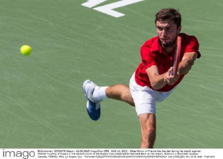 AUG 12, 2015 : Gilles Simon of France hits the ball during his match against Mikhail Youzhny of Russia in the second round of the Rogers Cup presented by National Bank at the Uniprix Stadium in Montreal, Quebec, Canada. TENNIS: AUG 12 Rogers Cup - Montreal Icon15081202 EDITORIAL USE ONLY