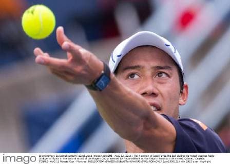 AUG 12, 2015 : Kei Nishikori of Japan eyes the ball during his match against Pablo Andujar of Spain in the second round of the Rogers Cup presented by National Bank at the Uniprix Stadium in Montreal, Quebec, Canada. TENNIS: AUG 12 Rogers Cup - Montreal Icon15081216 EDITORIAL USE ONLY